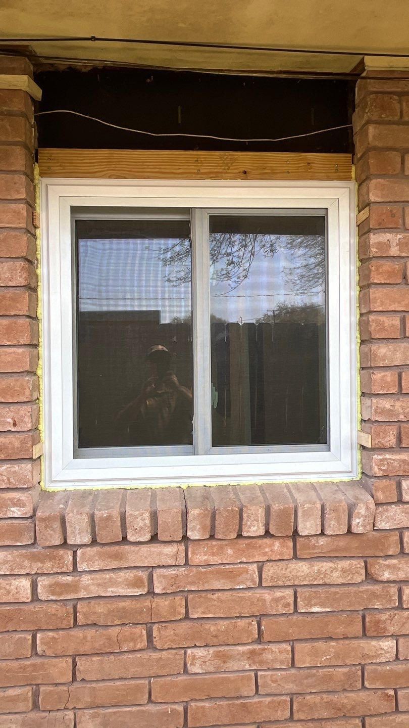 Windows in Brick with a Bay Window by Bayfront Roofing and Construction