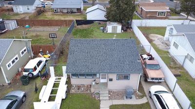 Residential Roofing Installation Featuring Granite Gray Shingles in Richland