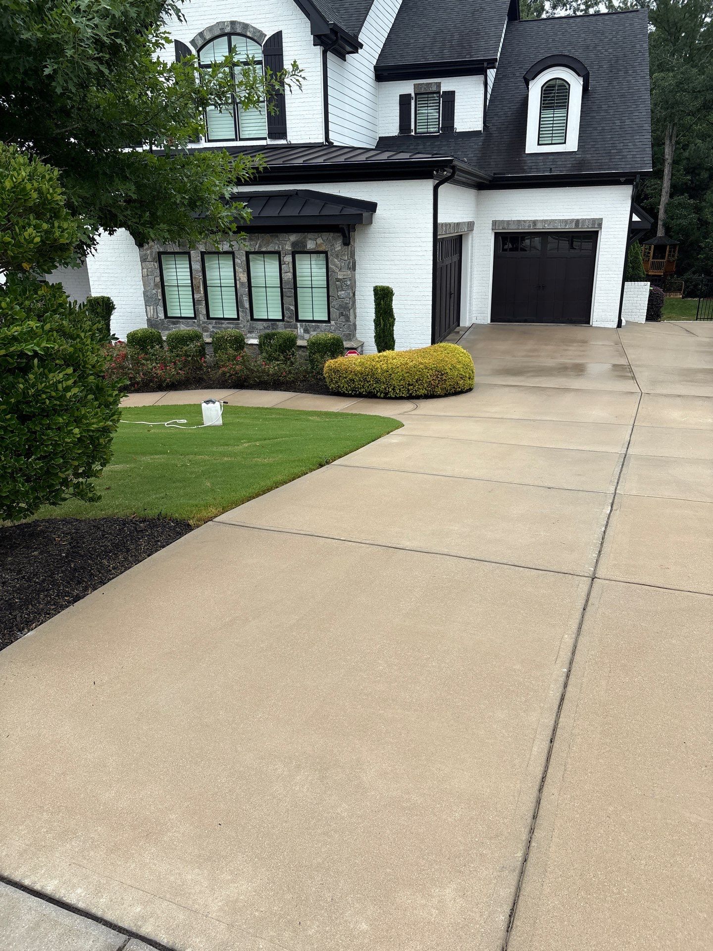 Concrete Driveway, Wood Playset using Wood Sealant and Concrete Sealant by DuraSeal