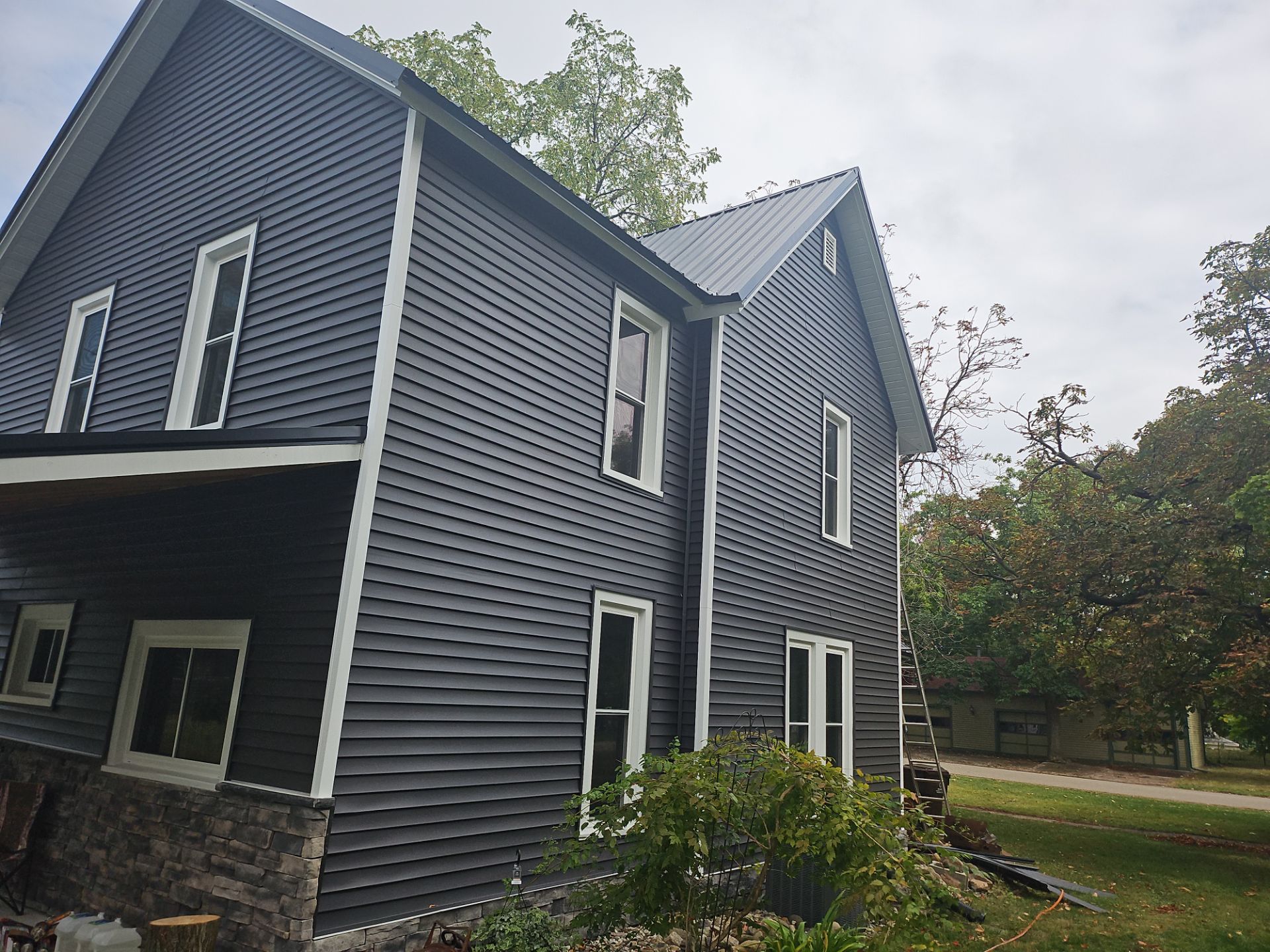 Exterior Makeover using Norandex Siding  by Energy Plus Home Improvements