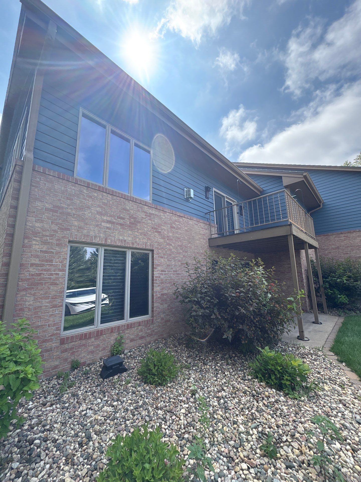 Residential Exterior Painting and Siding Refresh in Sioux Falls by Select Painting, Coatings & Garage Cabinets