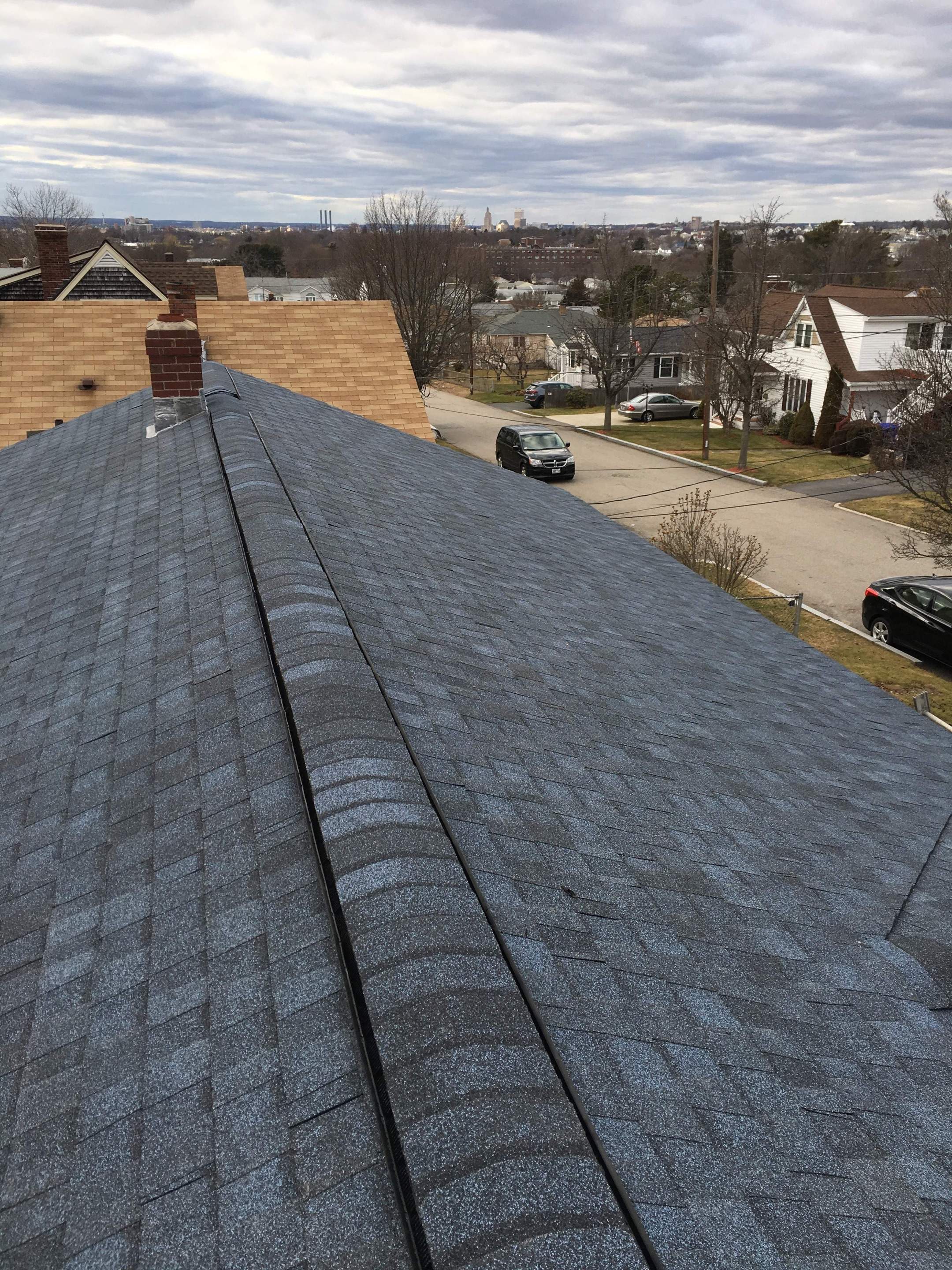 Coastal Blue Roofs by Pinnacle Roofing & Skylights