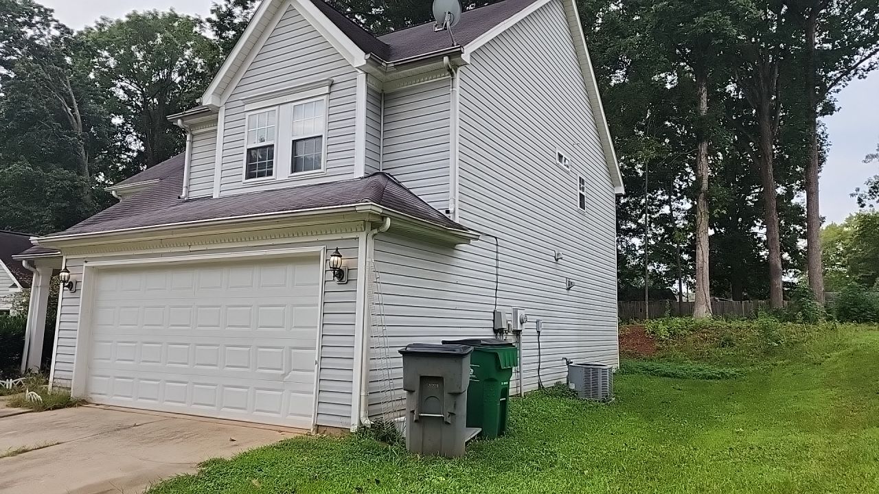 House Wash using cleaner by Power Wash Masters LLC