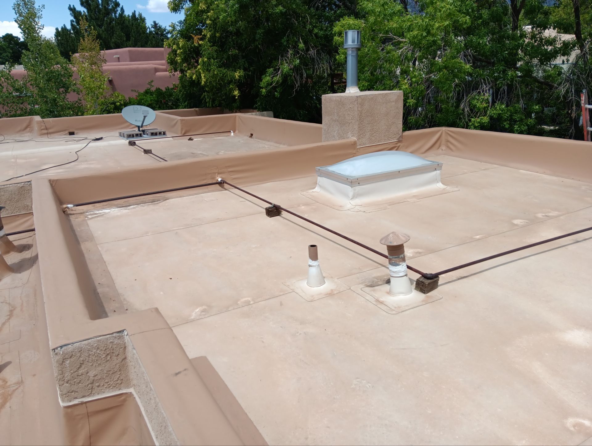 Tile and TPO Roof Maintenance and Gutter Cleaning in Sandia Heights by Doyle Roof Masters Inc