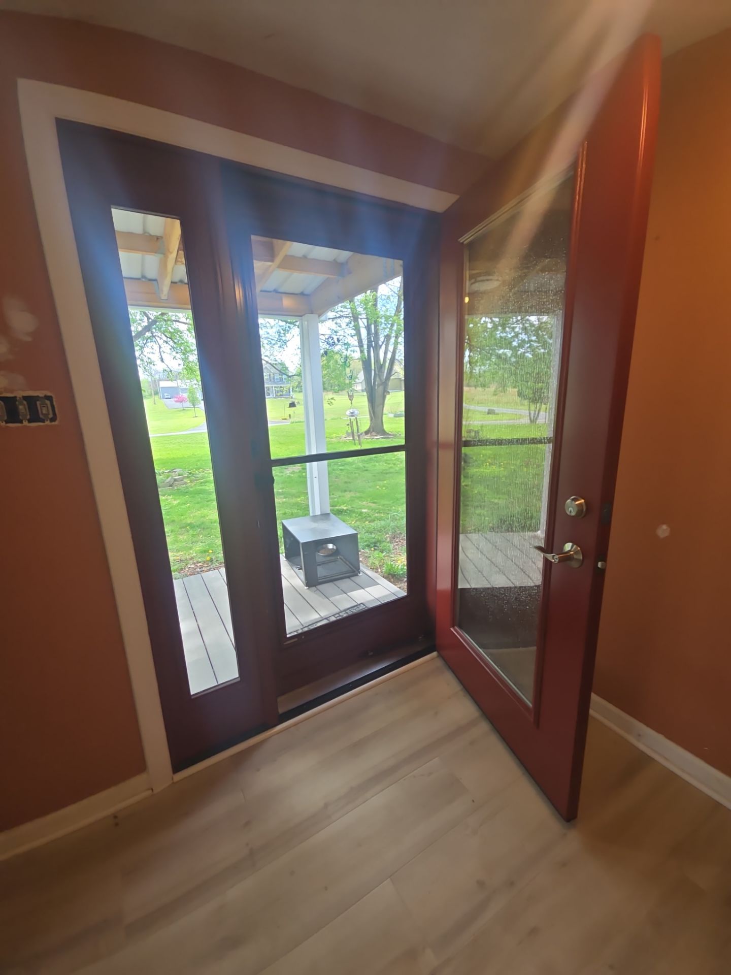 Entry Door with sidelite and storm door and bow by Aspen Home Improvements