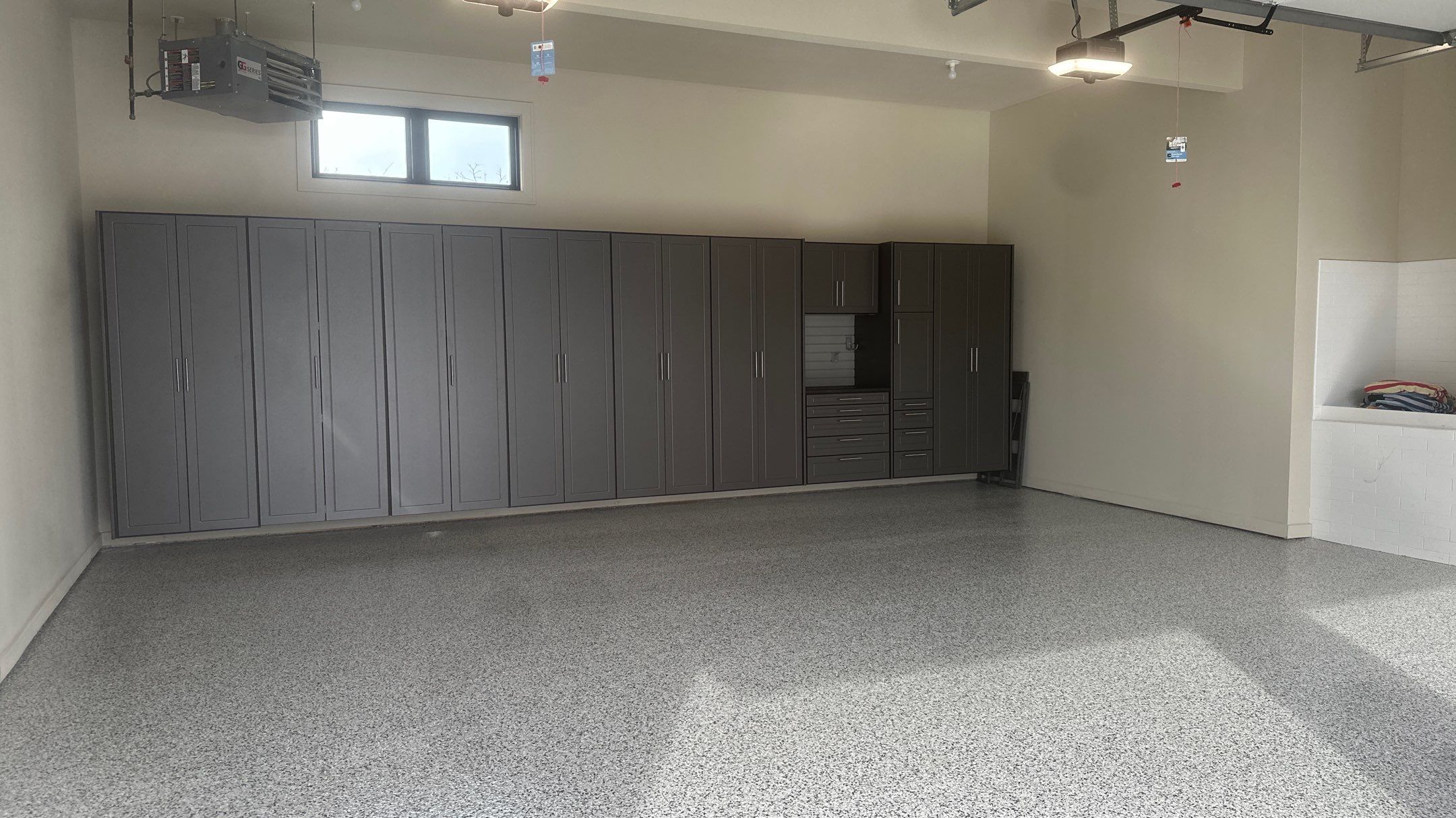 Tim S. added Cabinets and a Banner Garage Floor to his garage by Banner Garage