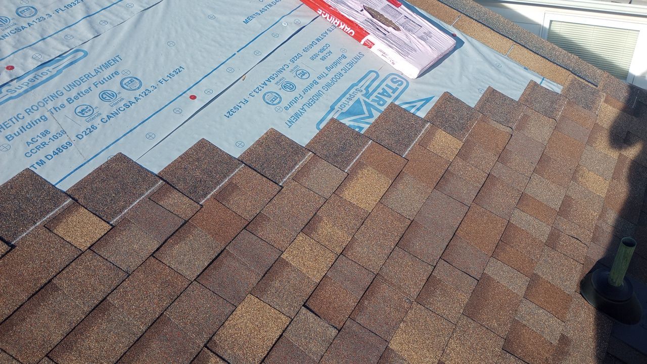 Residential Roofing Installation using Performance Shingles by Mr. Roofer
