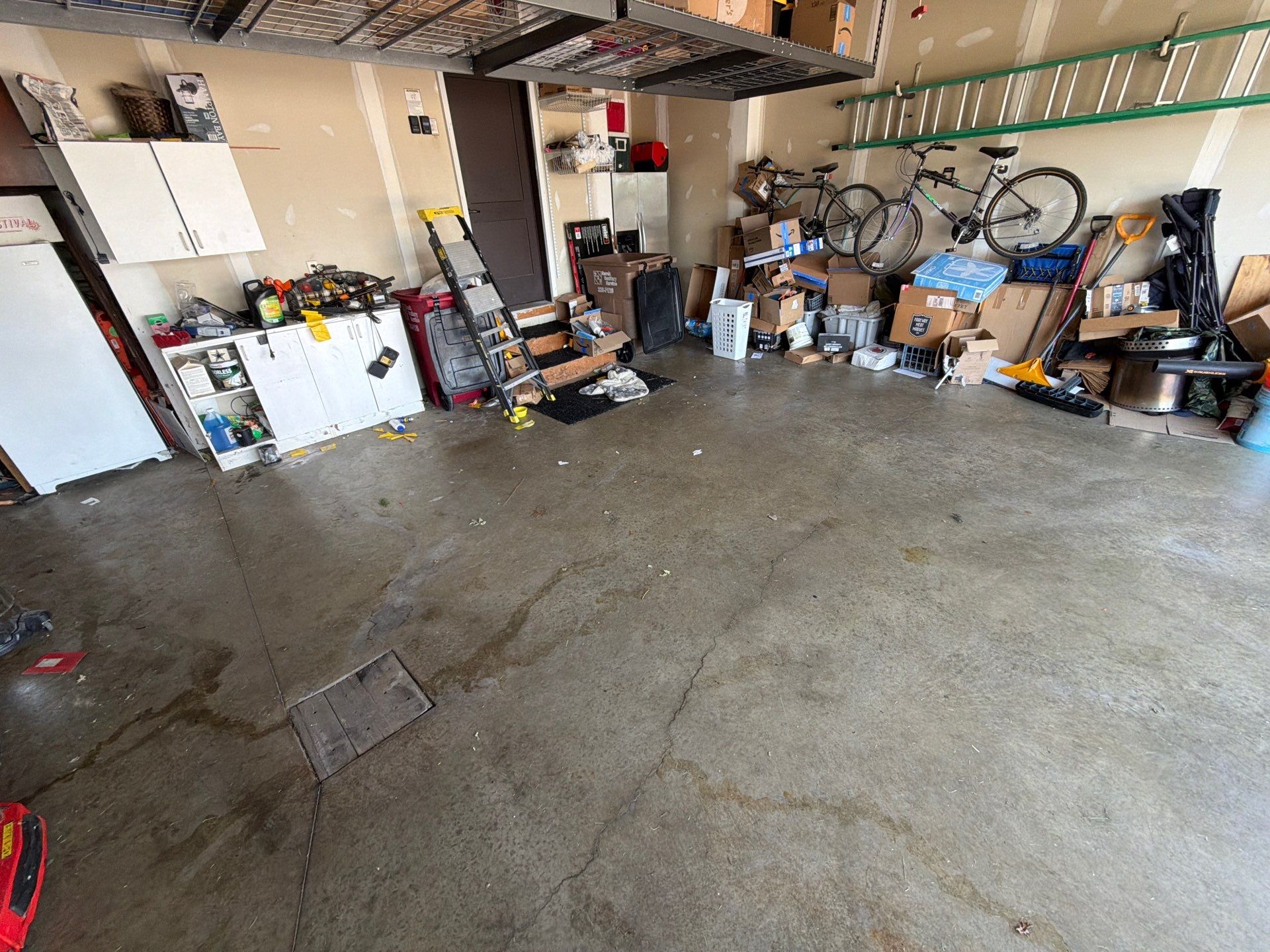 Sioux Falls Garage Concrete Grinding and Nightfall Decorative Chip Coating by Select Painting, Coatings & Garage Cabinets
