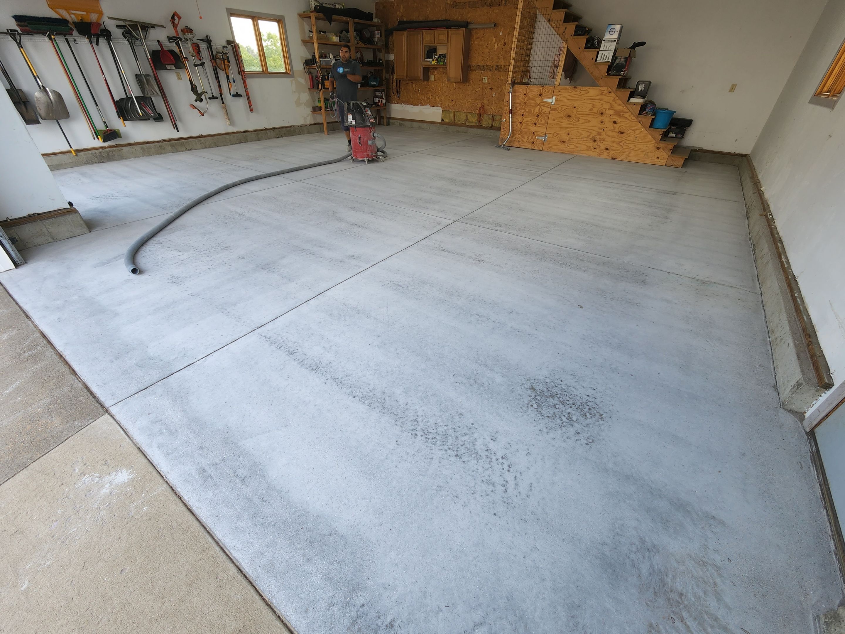 Garage using Slate Stone by Select Painting, Coatings & Garage Cabinets