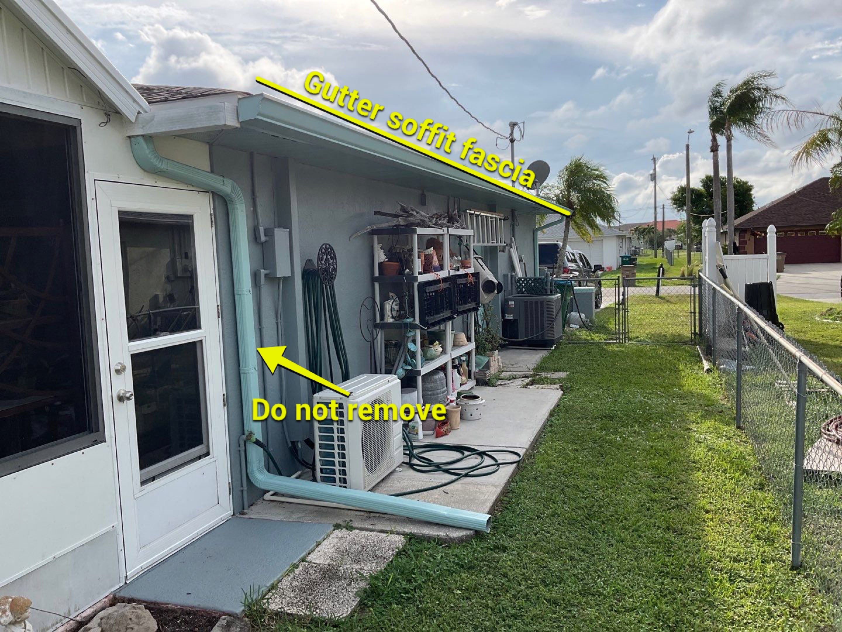Soffit and Fascia Installation using White Vinyl Soffit in Cape Coral FL by Gutter Professors