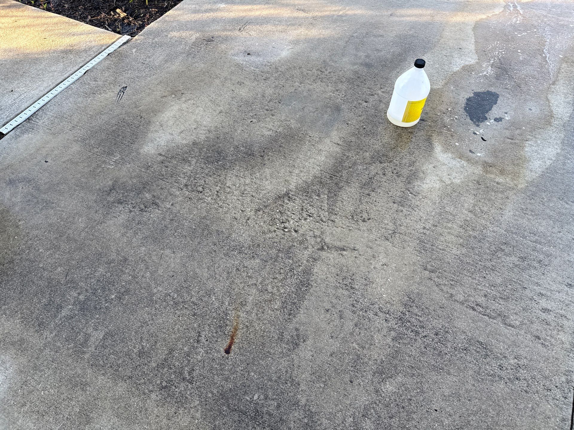 Oil Stain Removal & Concrete Cleaning – The Heights Community, Bradenton, FL by Sunshine AquaWash
