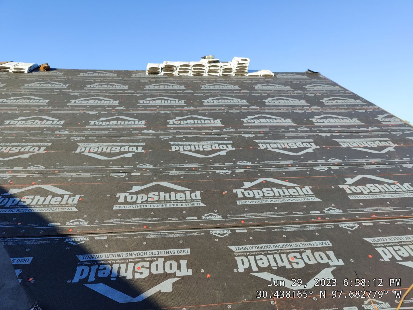 New Roof Installation Of IKO Dynasty Color Brownstone by DeZign Roofing & Exteriors