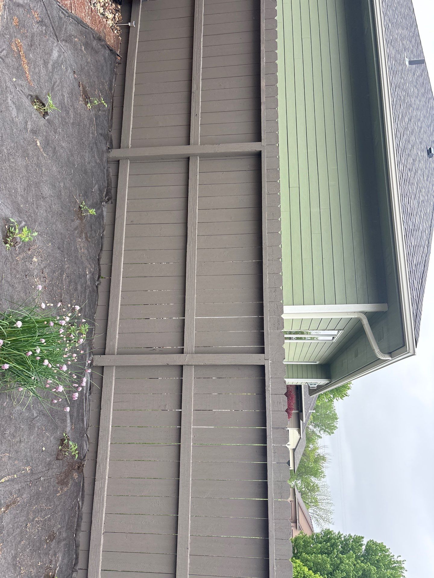 Sioux Falls Residential Exterior Update and Flagstone Pool Deck by Select Painting, Coatings & Garage Cabinets