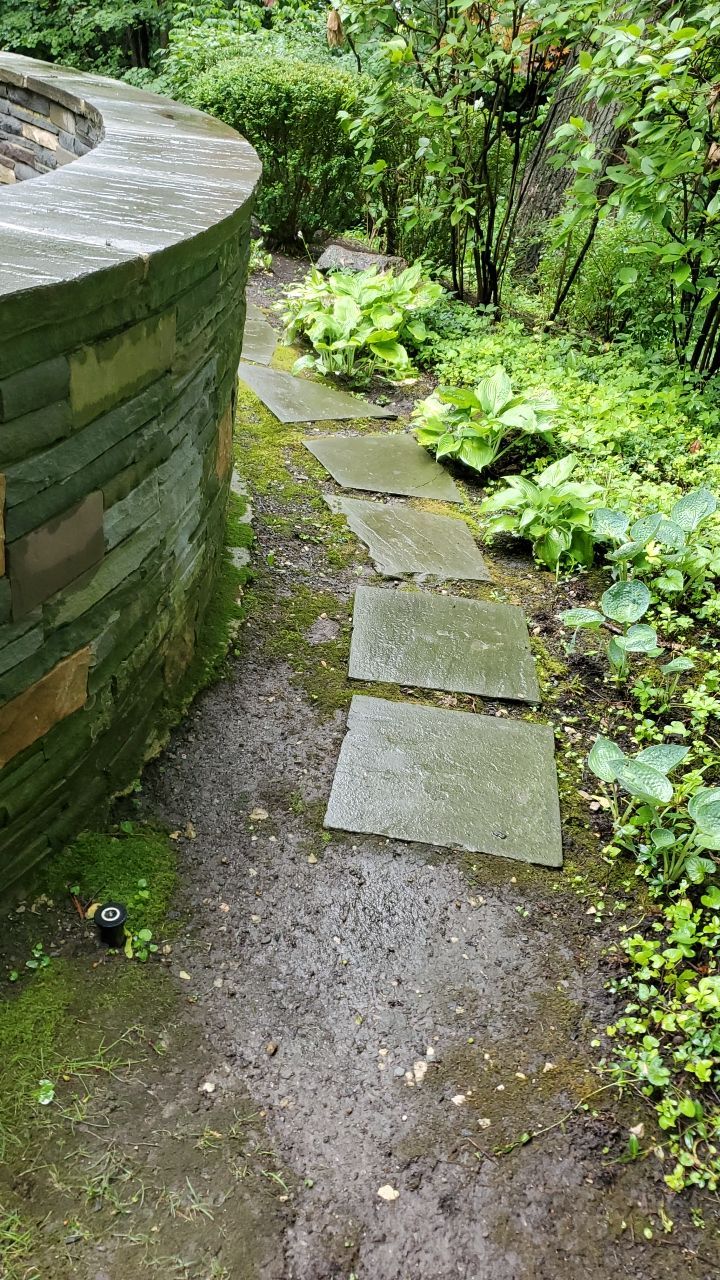 Bluestone patio cleaning by Northern Power Washing LLC.