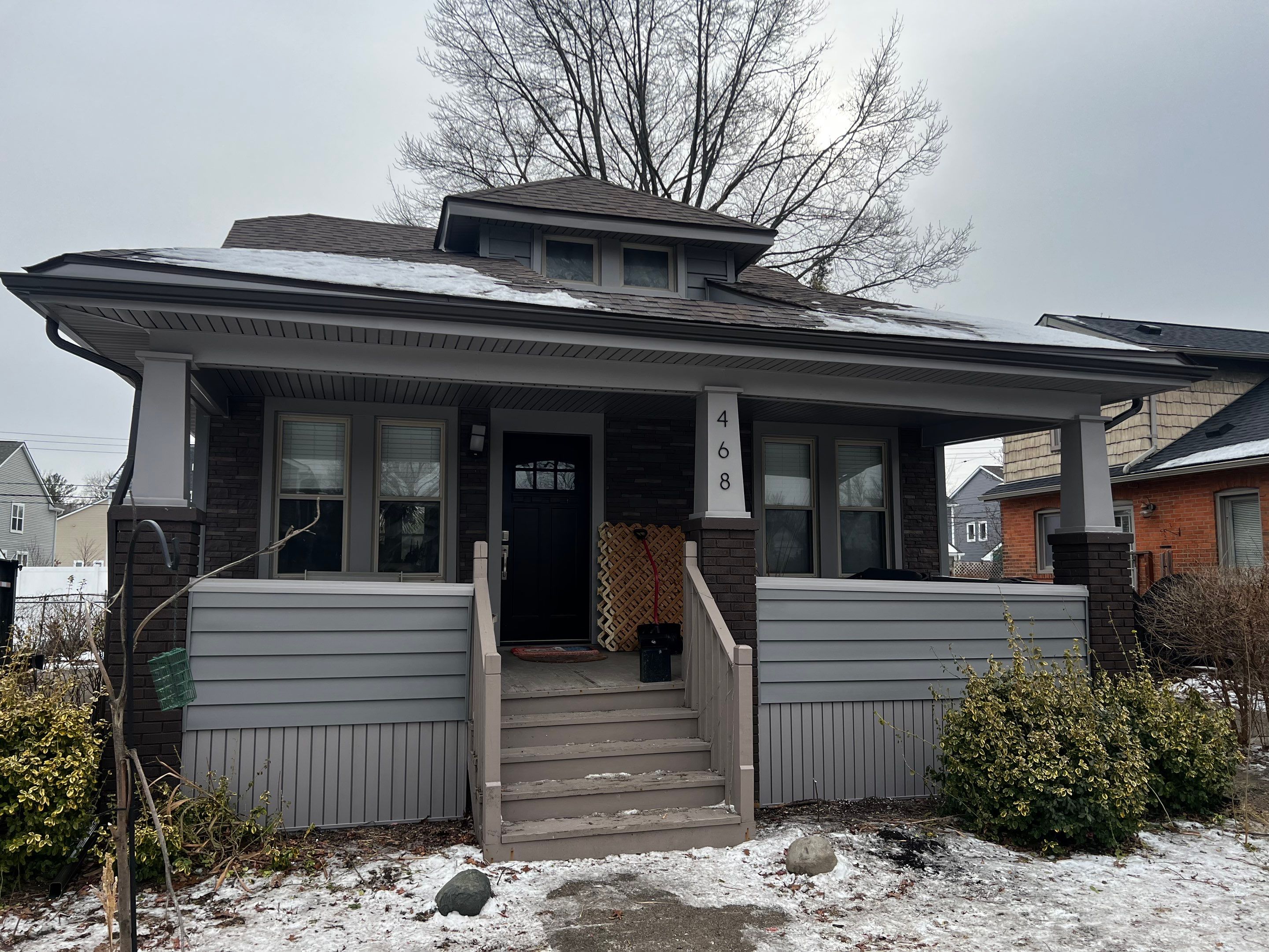 Vinyl Siding Replacement by Bloomfield Construction & Restoration