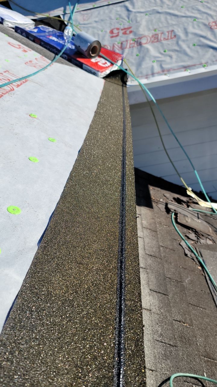Residential Roofing Installation using Roof Replacement by American Roofing & Construction LLC