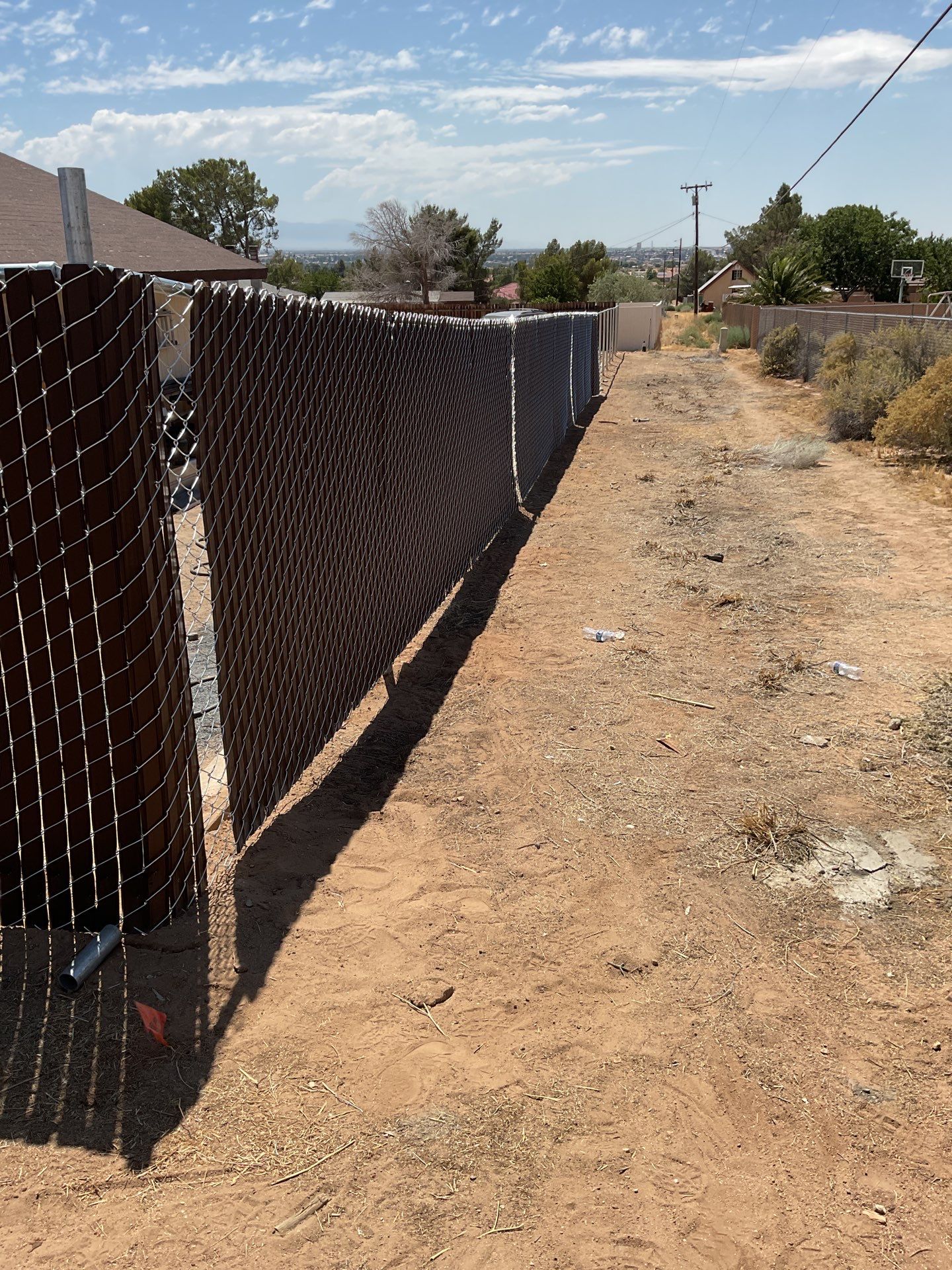 Dark Brown Privacy Chain Link Fence by Fence Guys Inc.