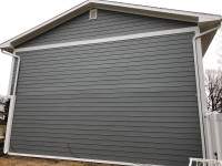 Siding Installation using JH Batten Smooth and JH Select Cedarmill Eased Edge by ExteriorPros