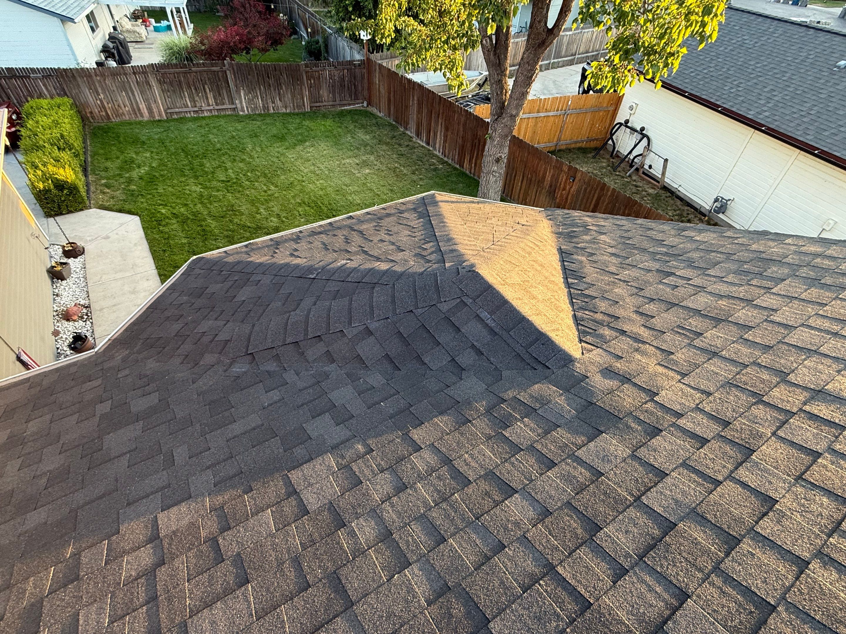 Residential Roof Replacement and Seamless Gutter Installation in Boise by Olive Roofing