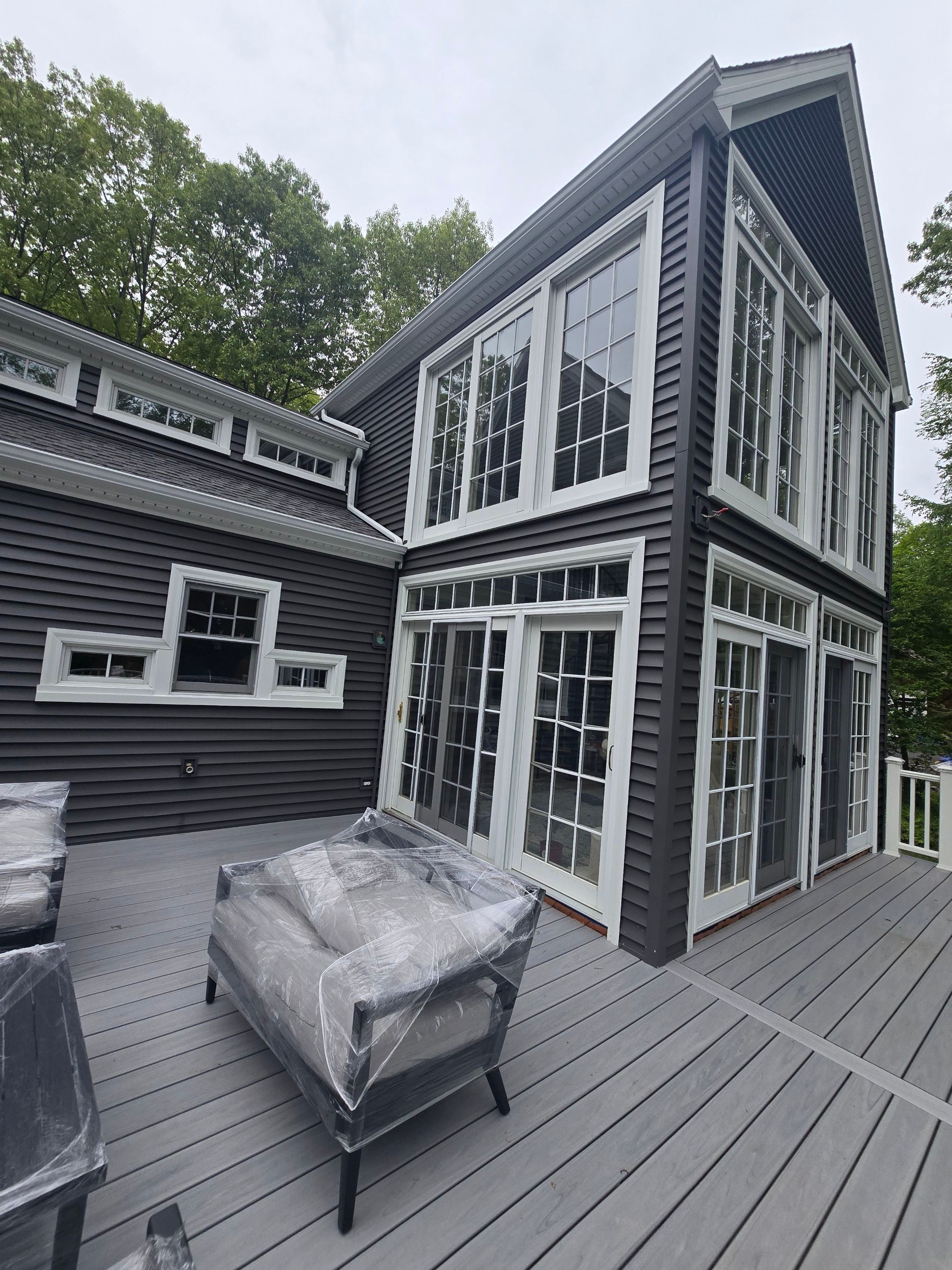 Siding refreshed with Cert. Monogram D/4 x 12'6" clapboard, Smoky Gray and Stone Facade, Coastal Gray by DiGiorgi Roofing and Siding Inc