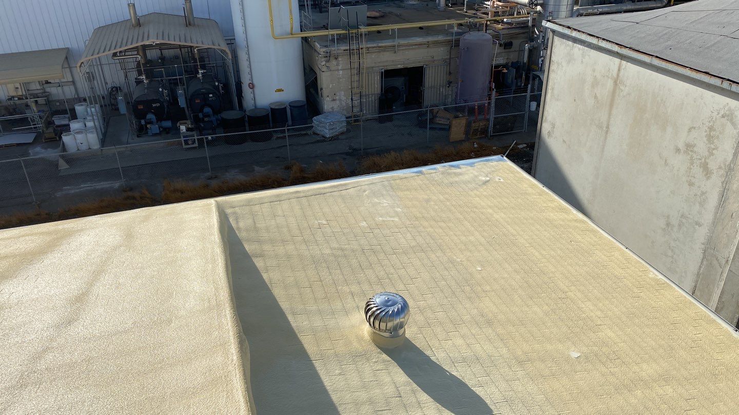 Spray foam and coatings using Polyurethane spray foam by Straight Edge Roofing Inc