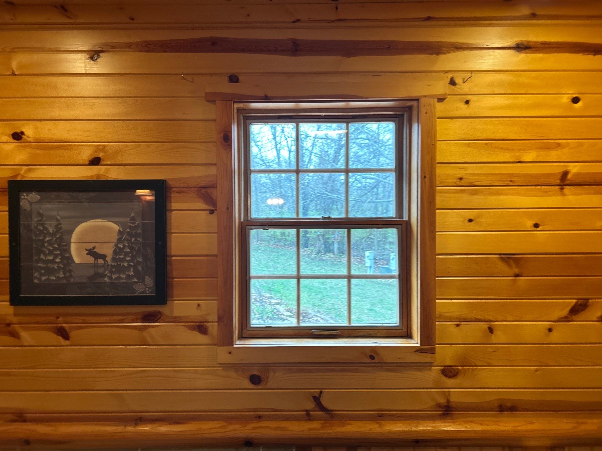 Pella Window installation using Pella Lifestyle wood/Aluminum window by United Windows and Siding LLC