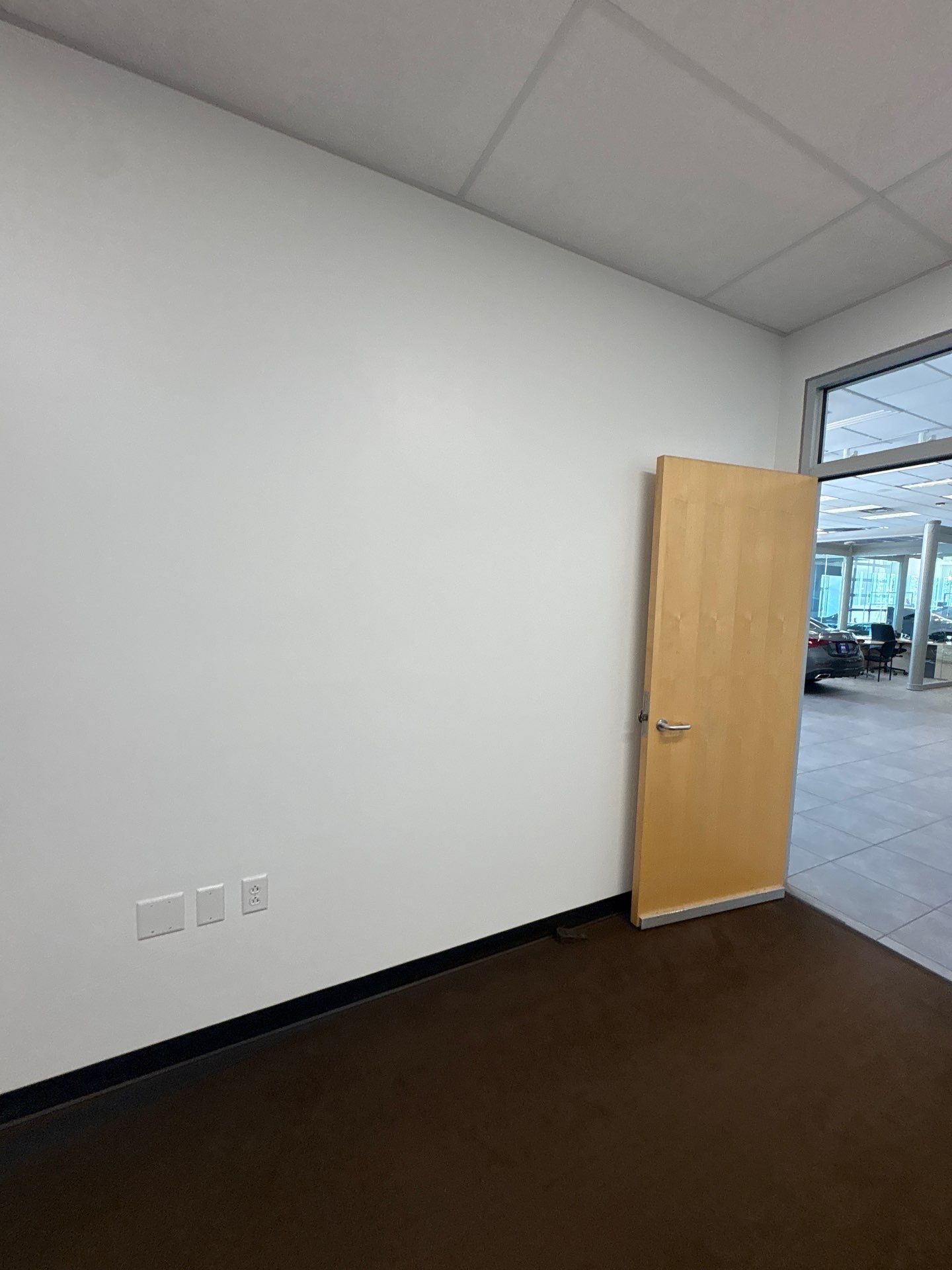 Interior Painting and Drywall Patching for Sioux Falls Commercial Showroom by Select Painting, Coatings & Garage Cabinets