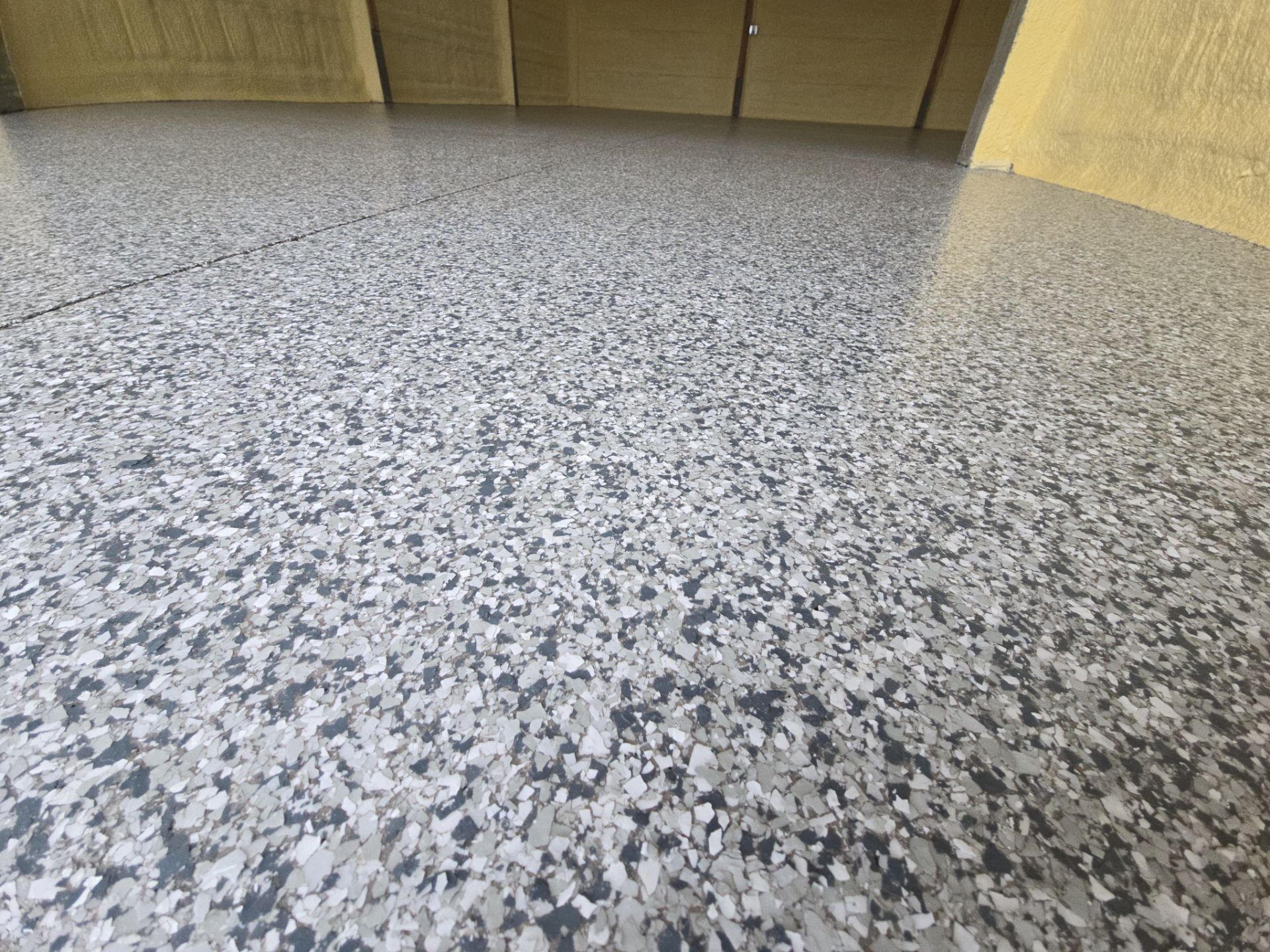 Garage Transformation using Slate Stone by Croc Coatings, LLC