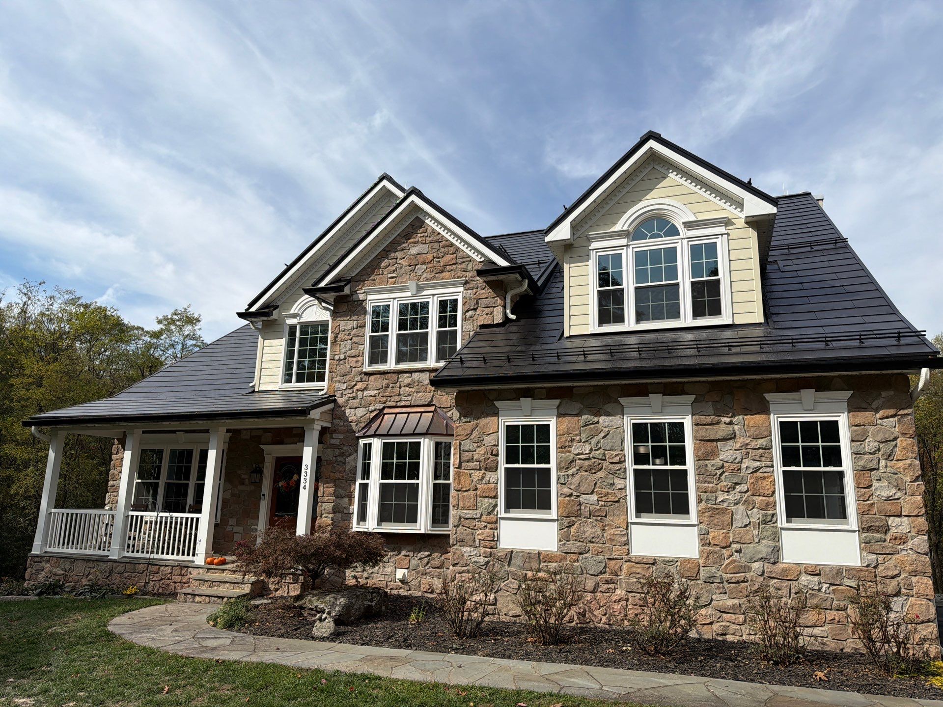 Beautiful James Hardie Siding & Tesla Solar Roof by American Home Contractors