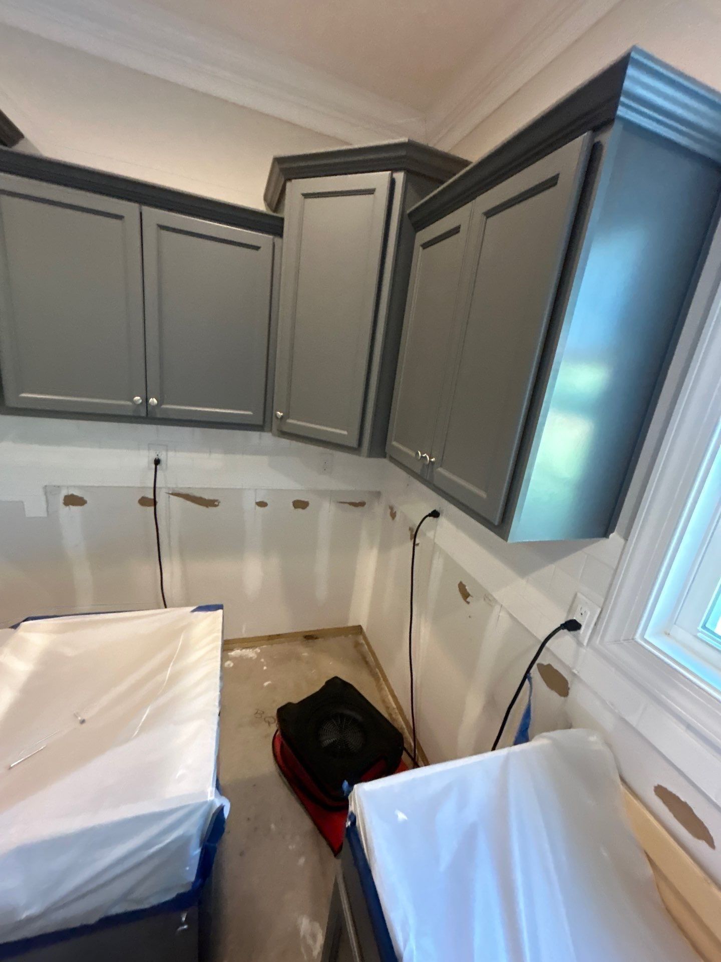 Laundry Room Flood Restoration by Home Disaster Medics