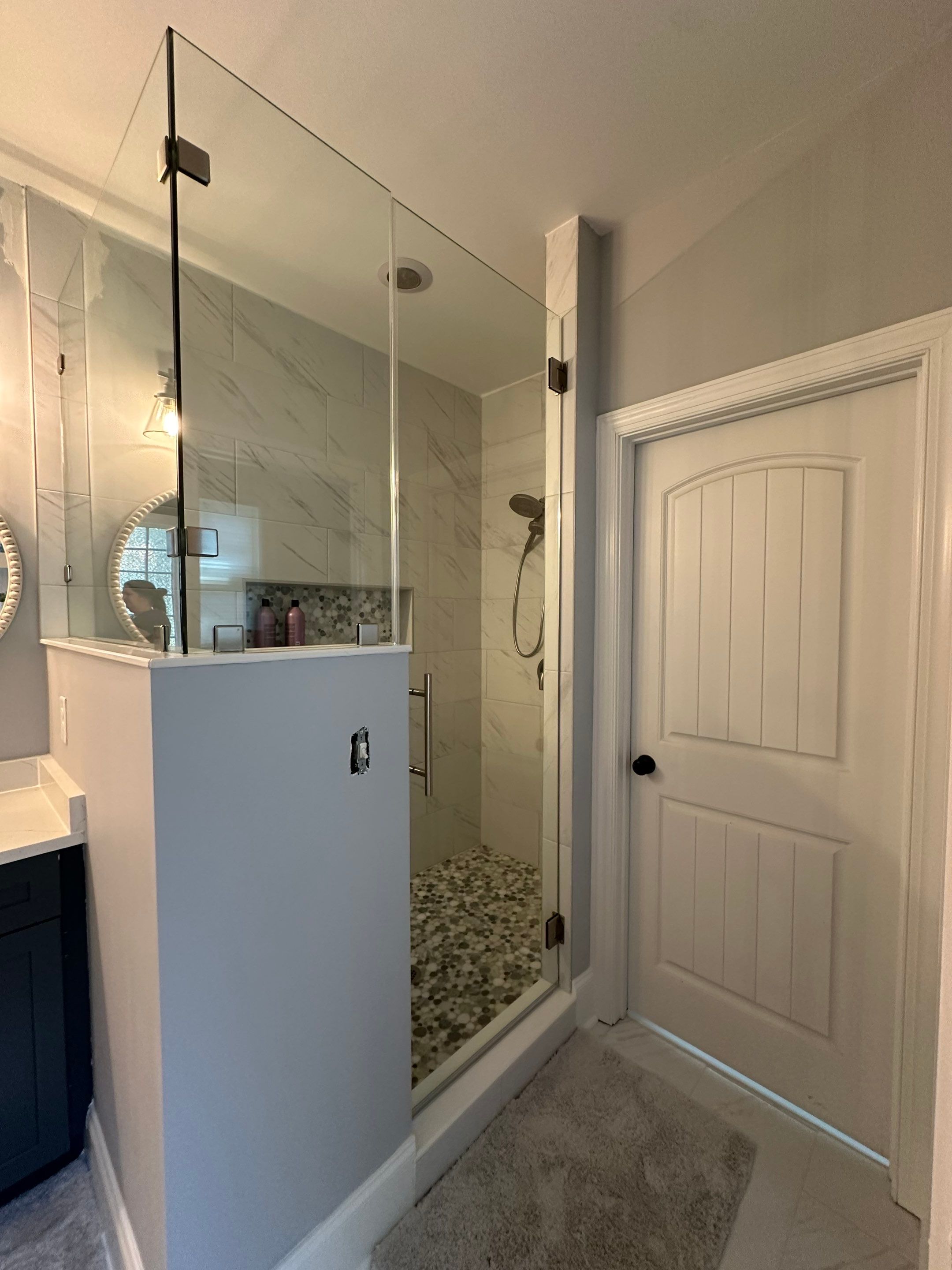 Bright Bathroom Remodel with Wall Removal, Stand Alone Tub and New Vanity by Footprints Floors of Coastal Carolina