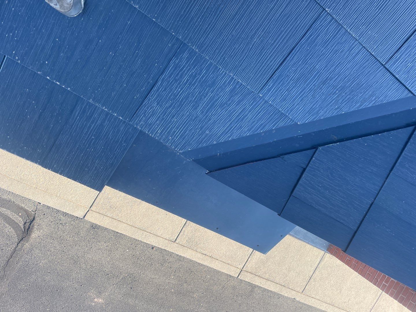 Tesla Solar Roof on a Commercial Building by American Home Contractors