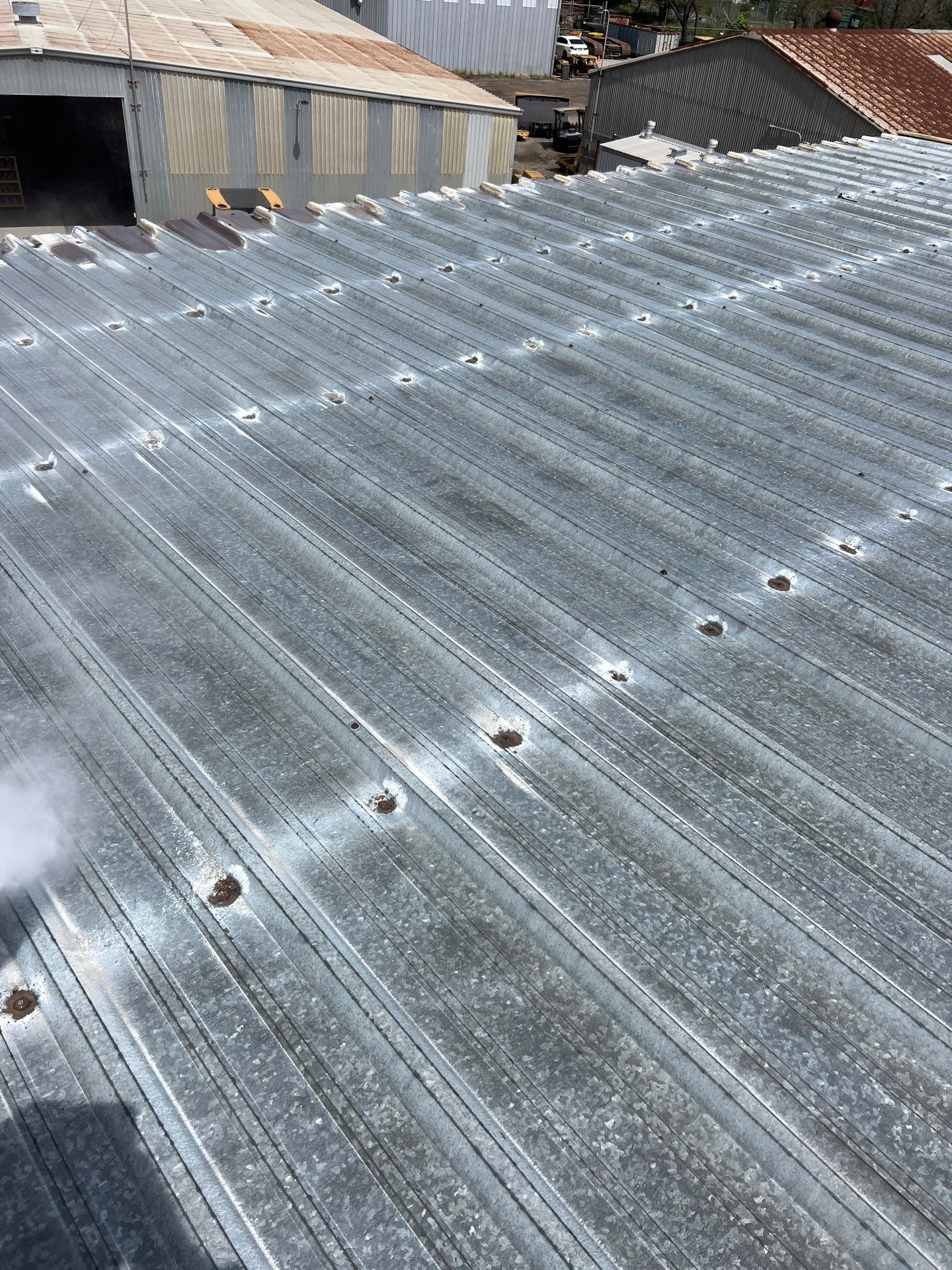 MR Roofing system using Conklin BenchPly system with PUMA top coat by Straight Edge Roofing Inc