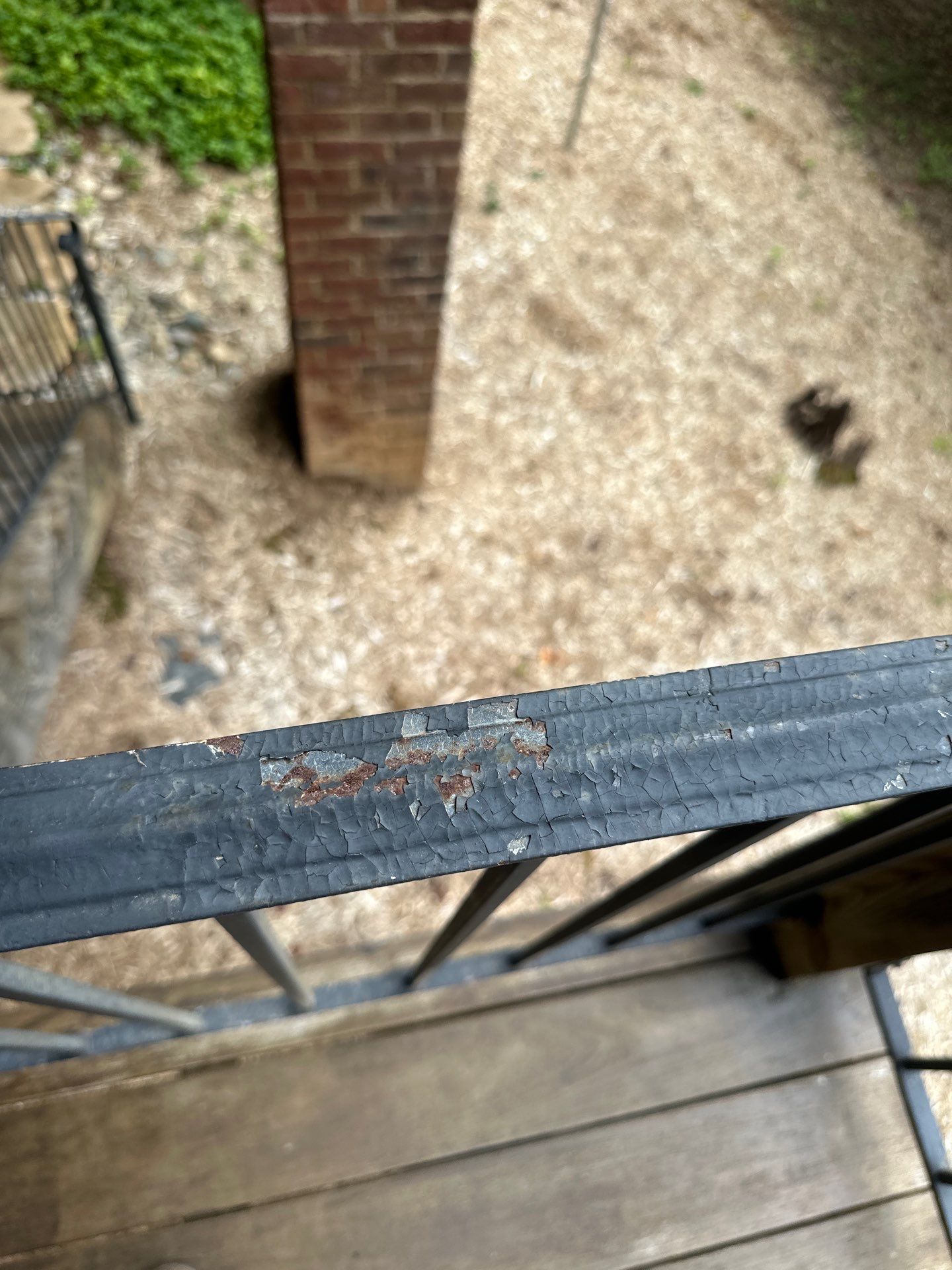 Wood Deck Refinishing and Black Metal Railing Upgrade in Travelers Rest by Painter1