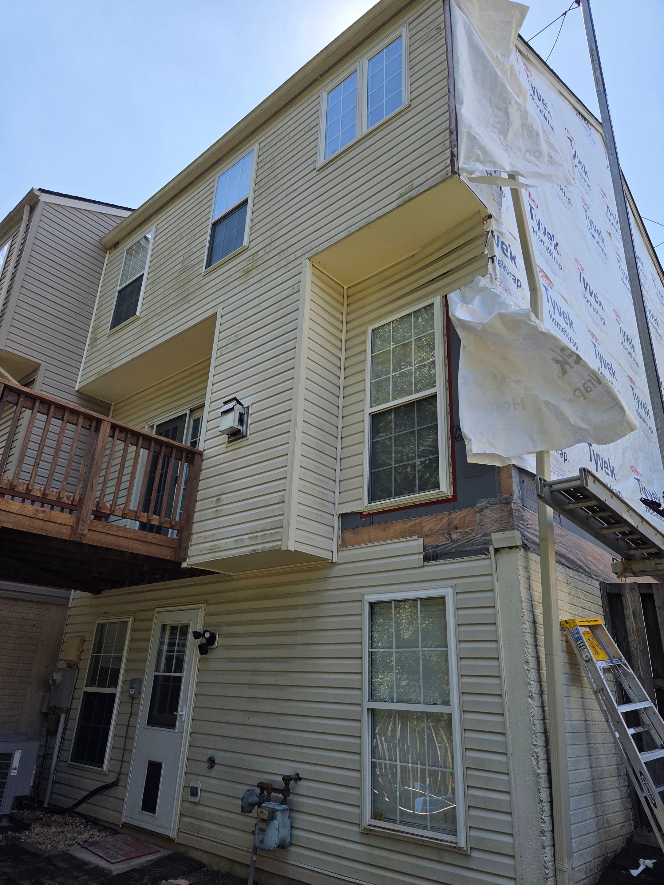Woodbridge: Siding Replacement with Mastic Ovation Vinyl siding in Linen  by RM Banning, Inc.