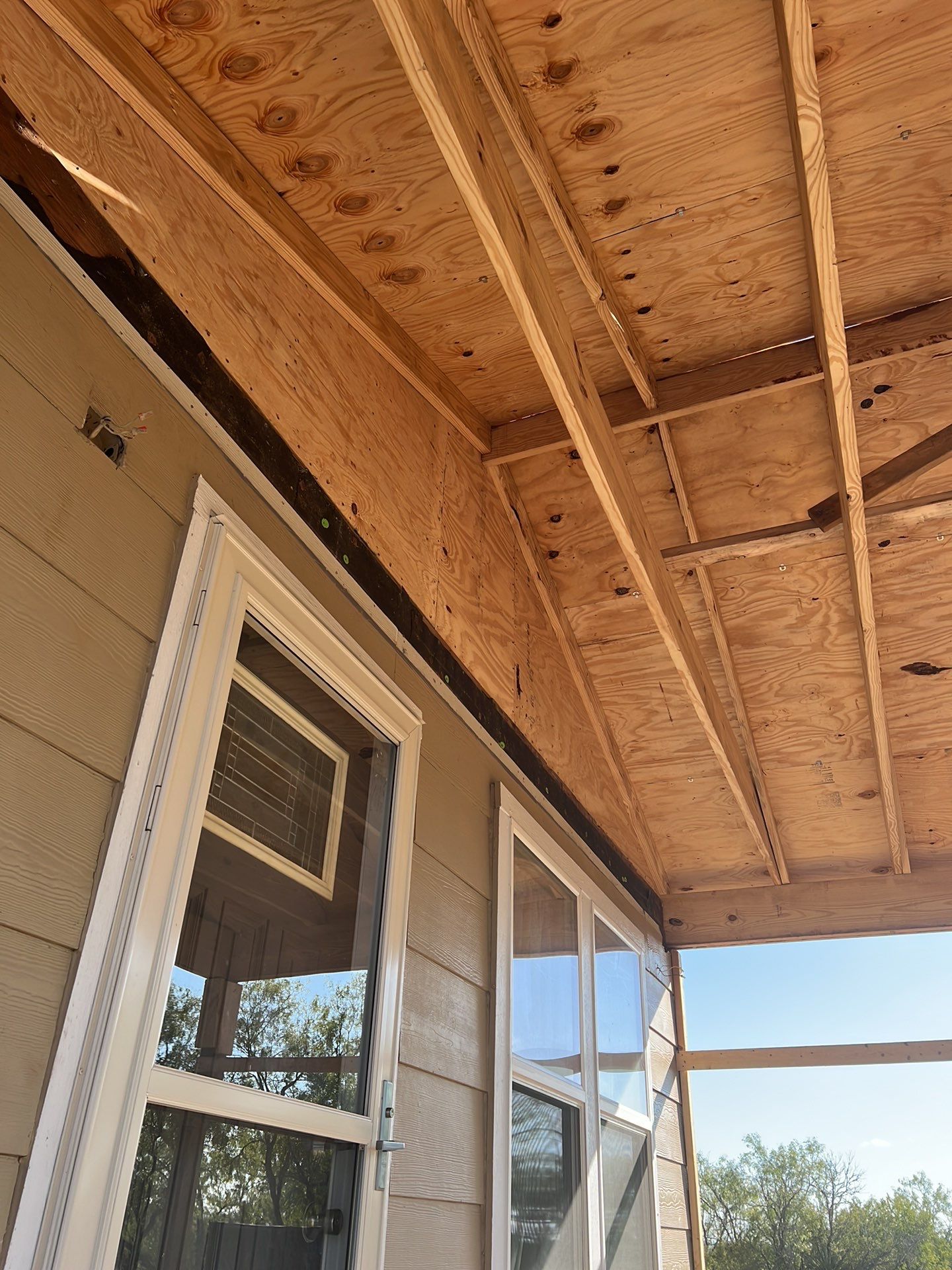 Front Porch Sitt'n by Bayfront Roofing and Construction