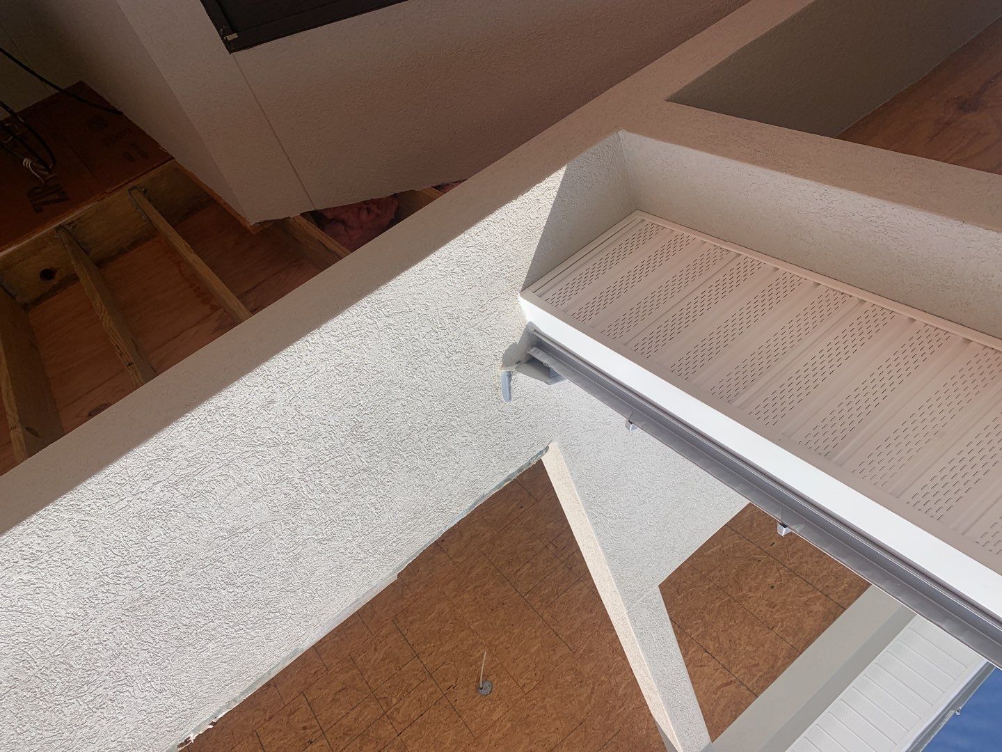 Soffit and Fascia Installation using White Vinyl Soffit in Pensacola FL by Gutter Professors