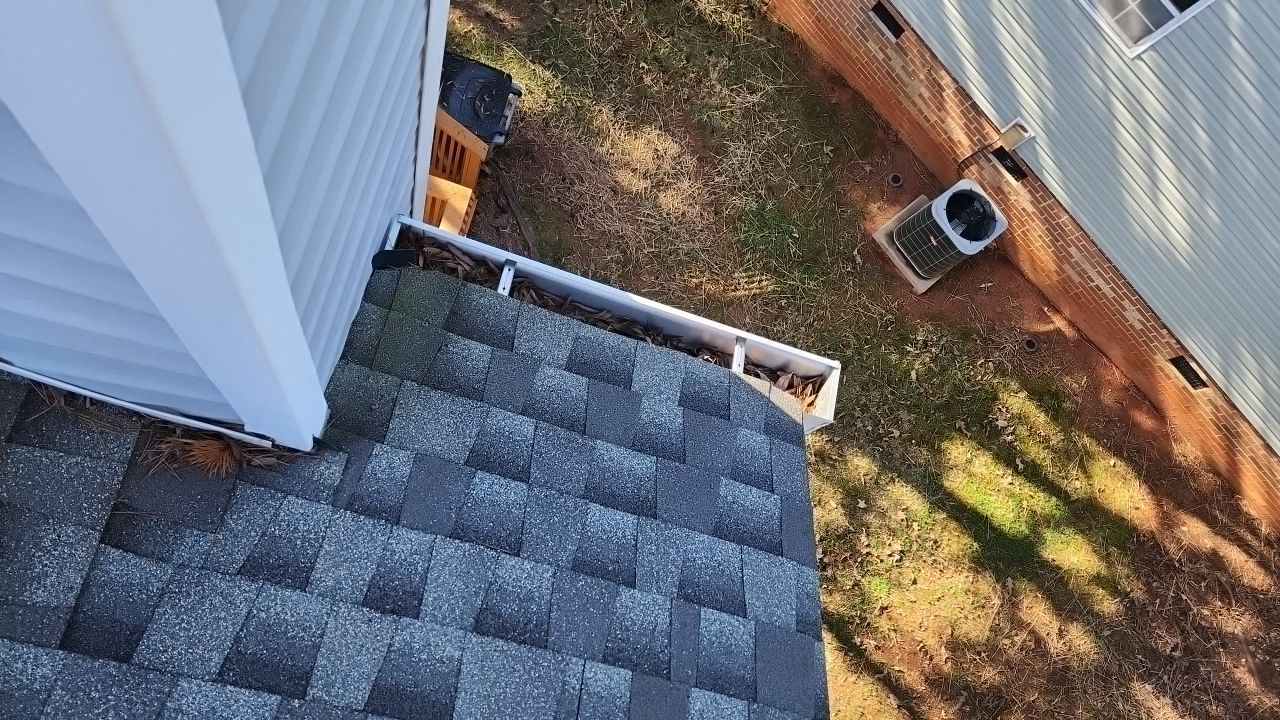 Gutter Cleaning using water by Power Wash Masters LLC