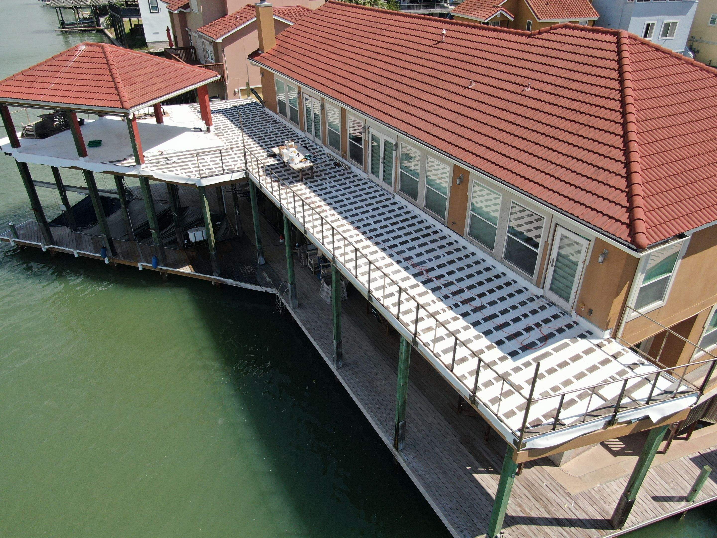 Walk Out Patio Cover by Bayfront Roofing and Construction