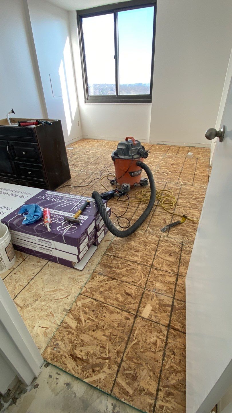 Apartament renovation  using Harwood floor  by Jesus Master Handyman LLC 