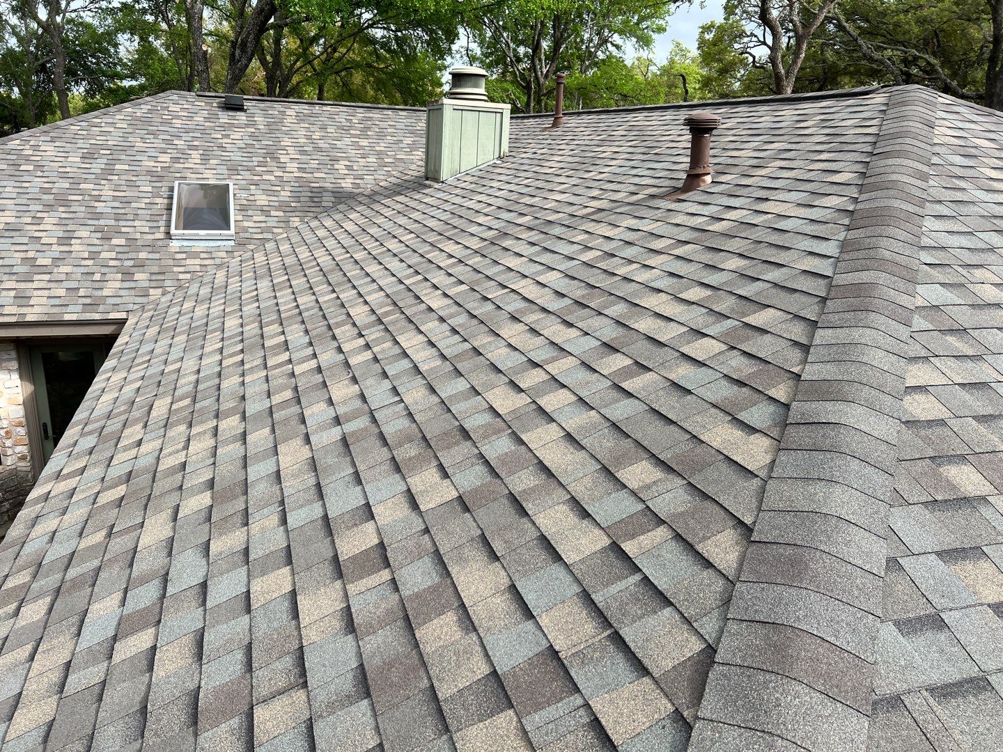 Winter storm 2023 with tree damage by Oakwood Roofing and Construction, LLC