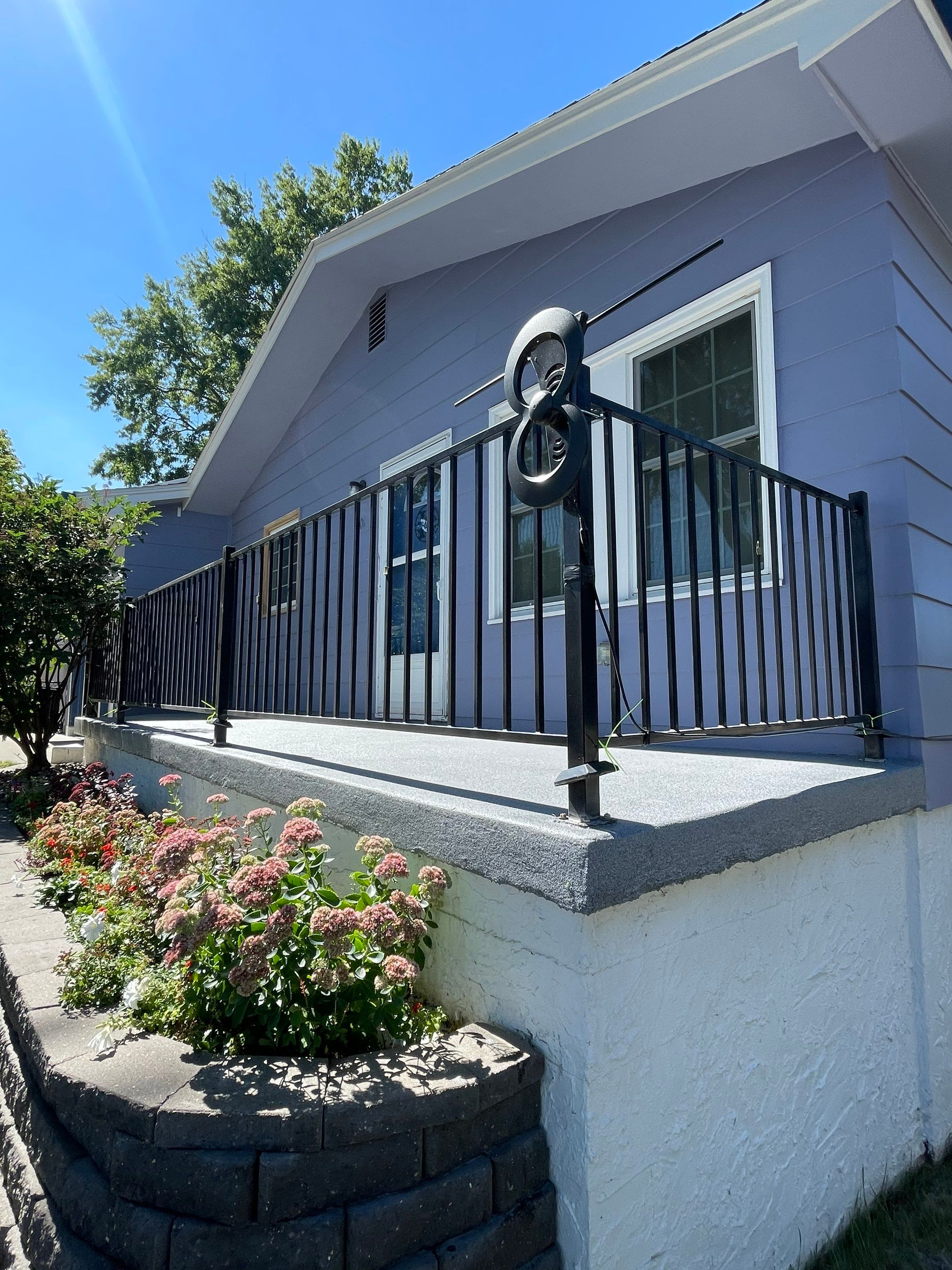 Sioux Falls Concrete Porch Coating with Starry Evening Finish by Select Painting, Coatings & Garage Cabinets