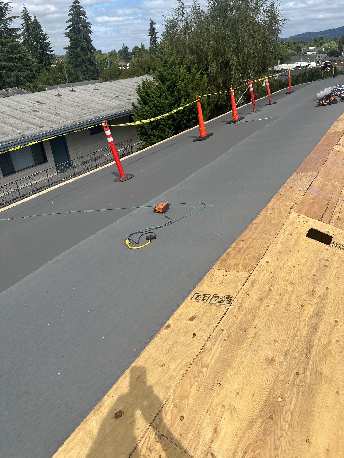 Commercial Flat Roof Installation using GAF 60Mil TPO  by Orezona Building & Roofing Company, Inc.