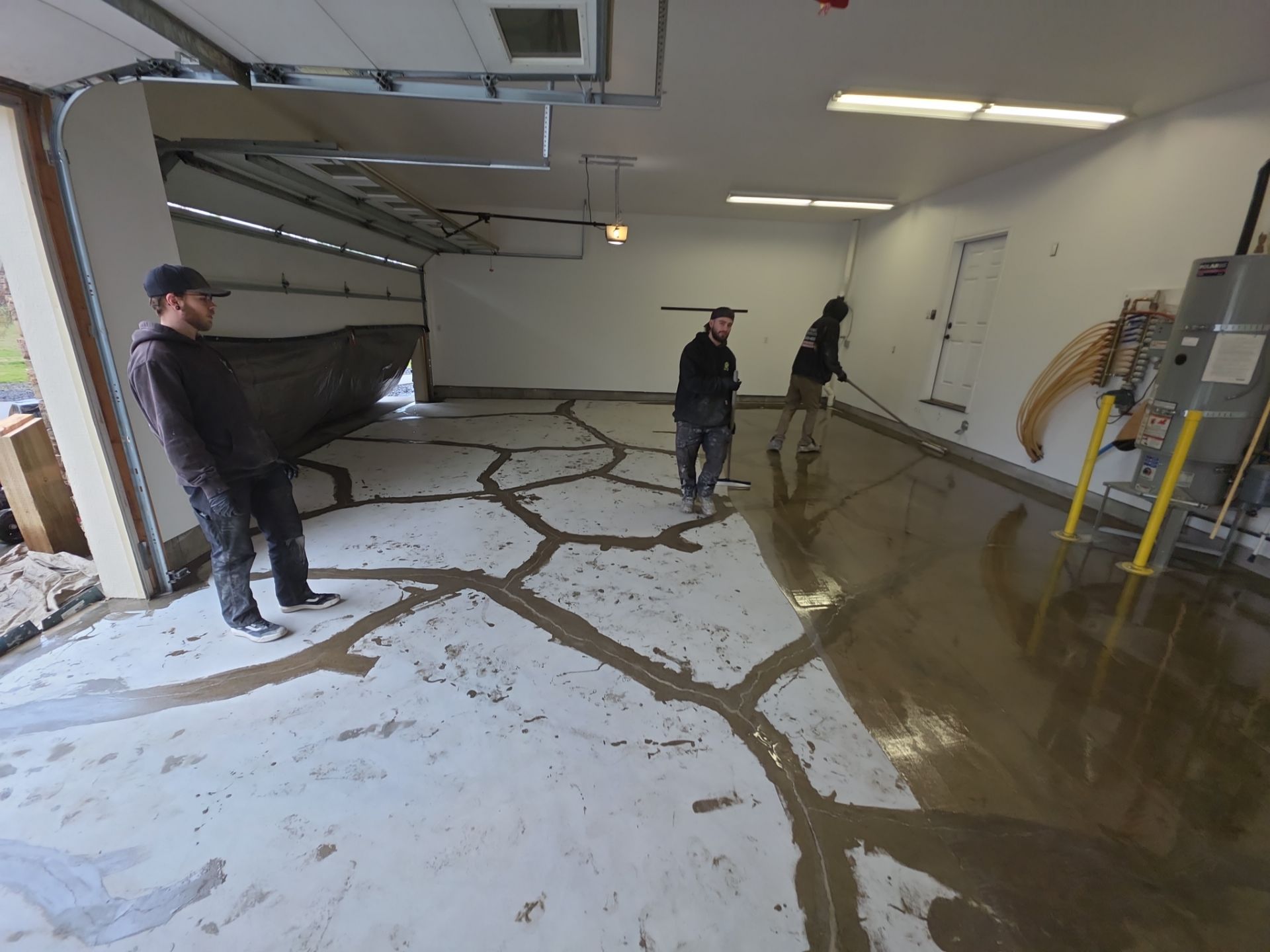 Travertine Hybrid Garage Floor Coating and Crack Repair in Spokane by Croc Coatings, LLC