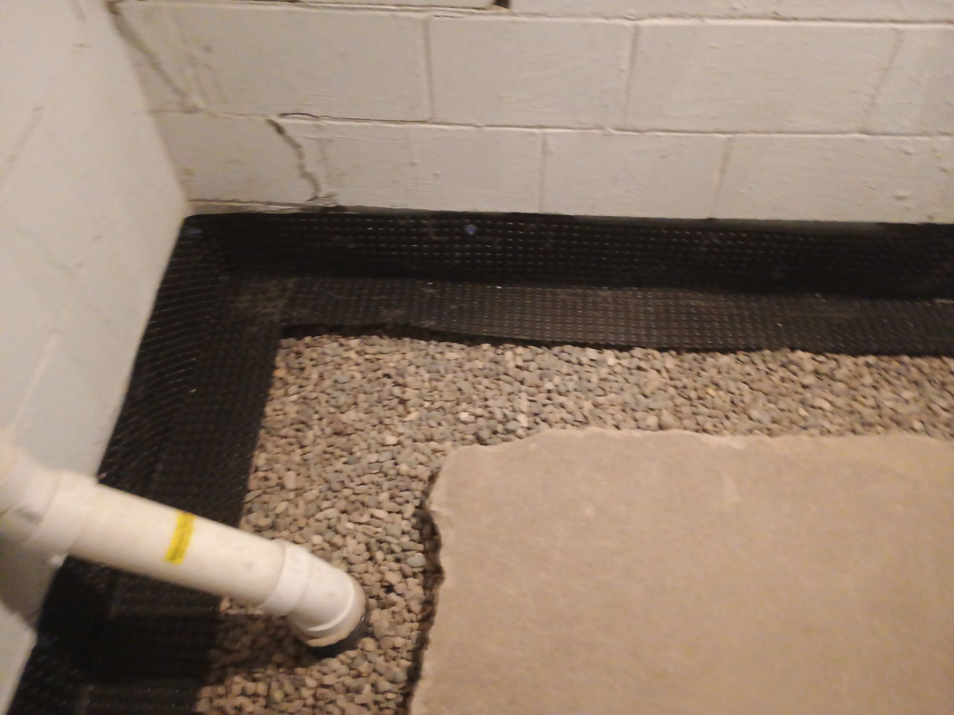 Interior Drain Tile Installation in South Minneapolis by Waterproofing Northeast