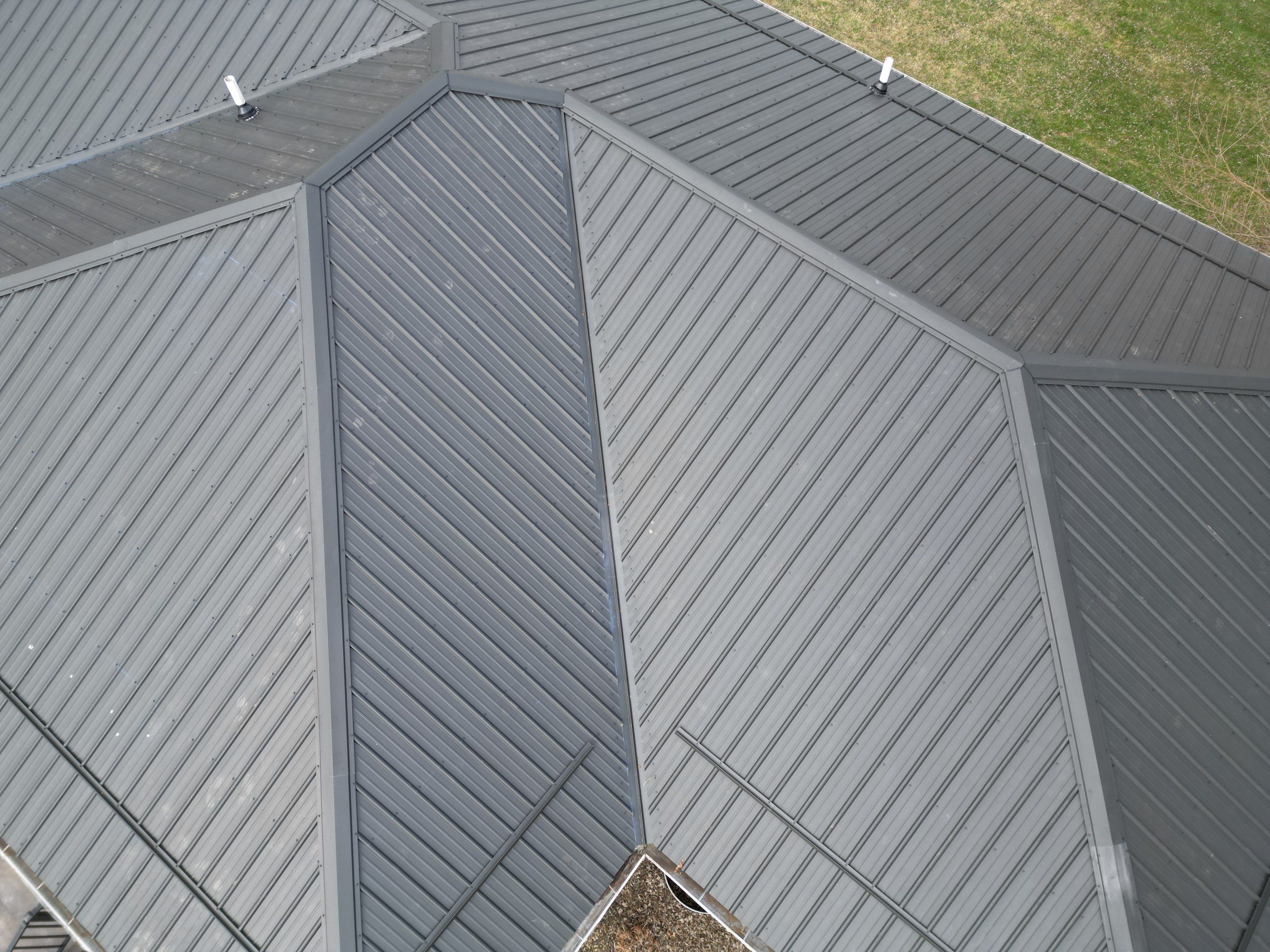 Commercial Roofing Installation using Performance Panel Metal - Frost Black by RoofX 