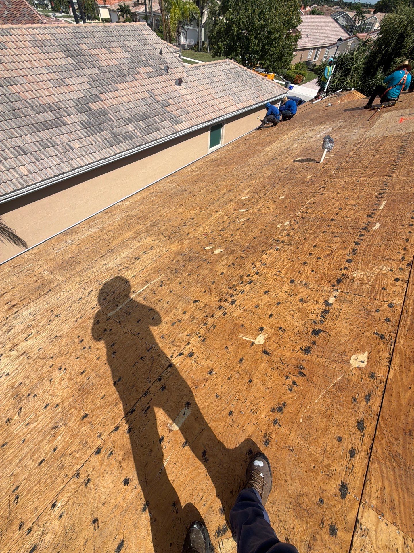Tile Roof Replacement and Sheathing Repair in Boynton Beach by Aastro Roofing