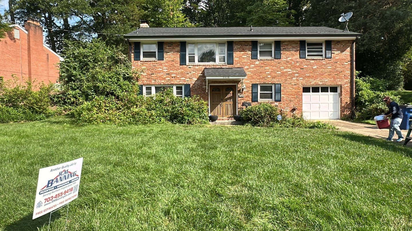 Springfield Tree Damage Restoration: CertainTeed Landmark Designer Shingles in Charcoal Black by RM Banning, Inc.