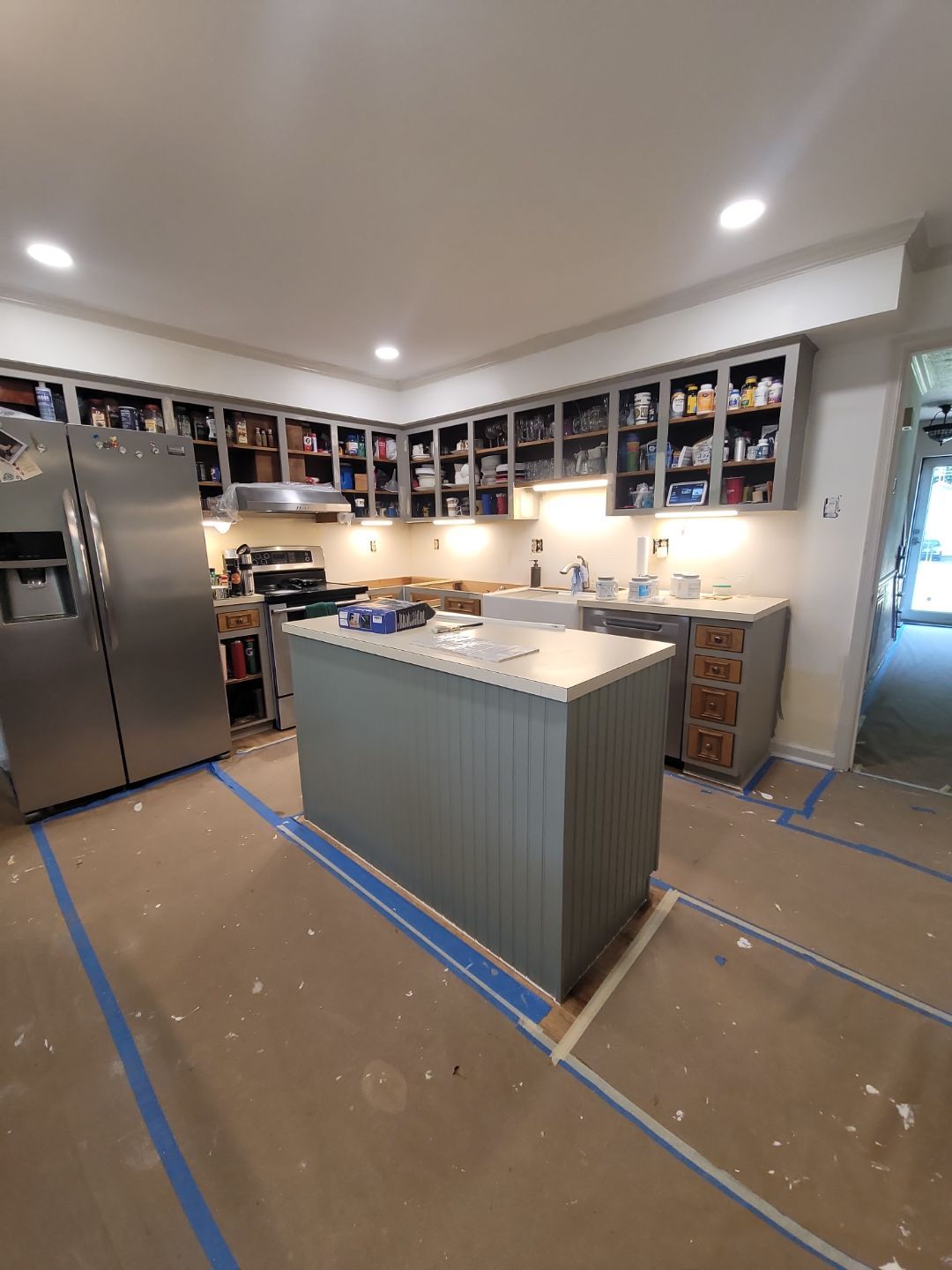 A Pathway to Personality – A Two-Tone Kitchen Transformation in Apex by Elite Remodeling and Design LLC