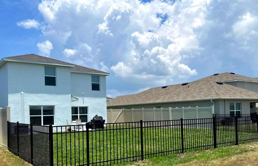 Aluminum Fence Installation using Black 3 Rail Aluminum Fence and Tan Vinyl Privacy Fence by Asap fence and gates, LLC